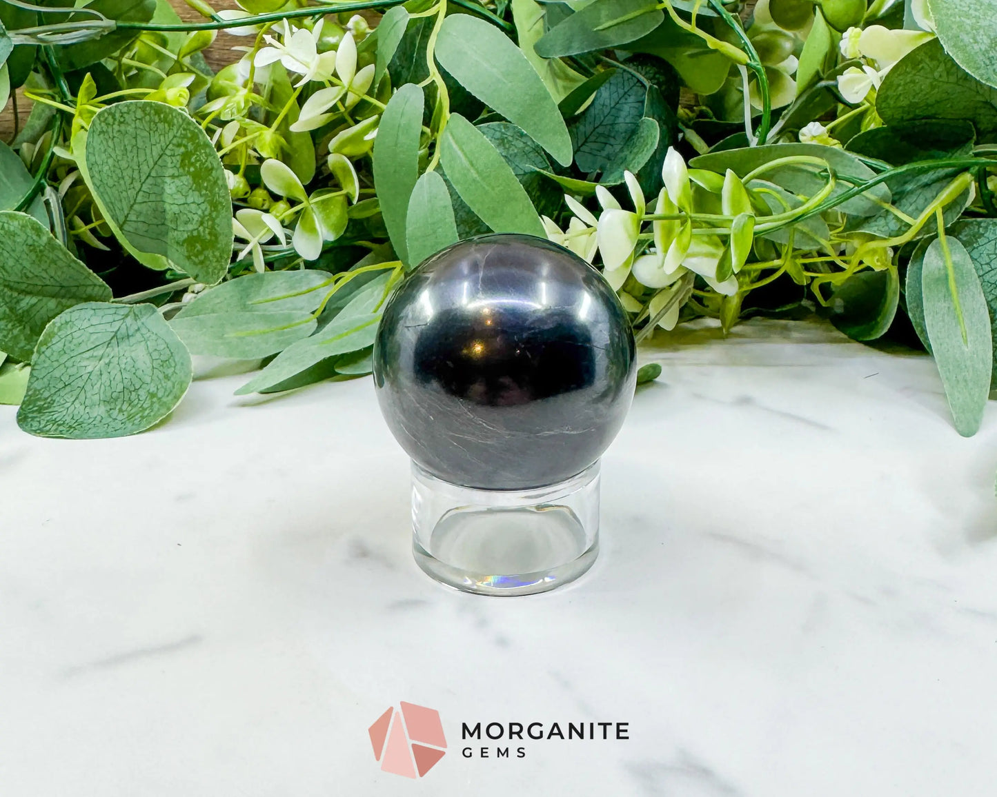 54mm Polished Shungite Sphere – High-Carbon Grounding Stone & EMF Protection Decor - Metaphysical Crystals