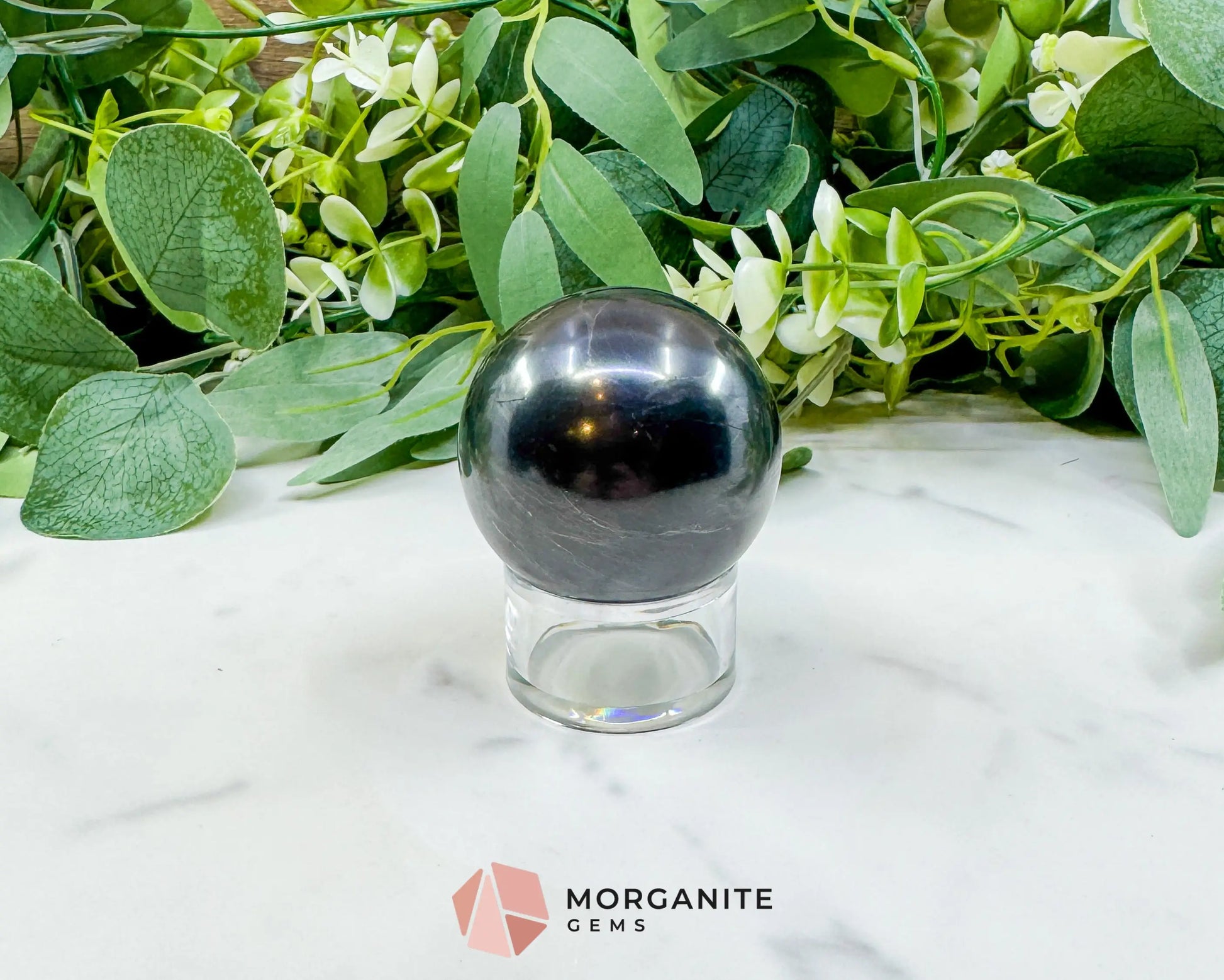 54mm Polished Shungite Sphere – High-Carbon Grounding Stone & EMF Protection Decor - Metaphysical Crystals