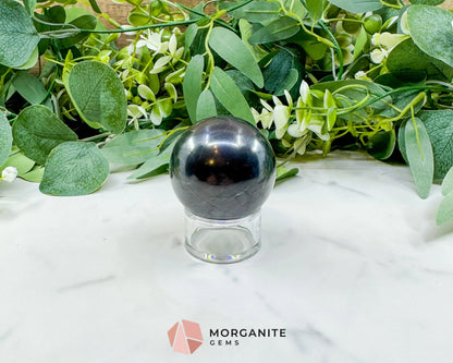 54mm Polished Shungite Sphere – High-Carbon Grounding Stone & EMF Protection Decor - Metaphysical Crystals