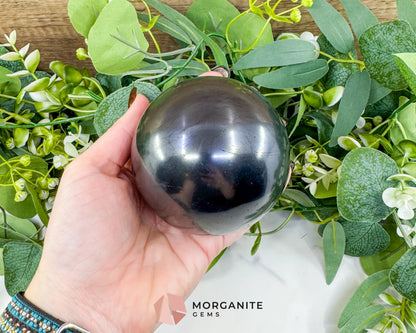 84mm Polished Shungite Sphere – High-Carbon Grounding Stone & EMF Protection Decor - Metaphysical Crystals