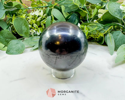 84mm Polished Shungite Sphere – High-Carbon Grounding Stone & EMF Protection Decor - Metaphysical Crystals