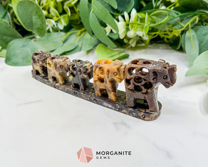 Hand-Carved Soapstone Elephant Train – 7" Undercut Lattice Sculpture – Natural Stone Family of Five Figurine for Luck & Wisdom