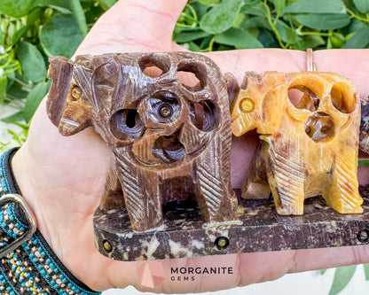 Hand-Carved Soapstone Elephant Train – 7" Undercut Lattice Sculpture – Natural Stone Family of Five Figurine for Luck & Wisdom