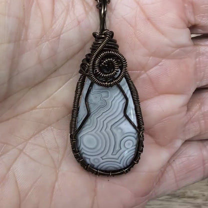 Wire-Wrapped Agate with Gray and White Patterns and Bronze Necklace